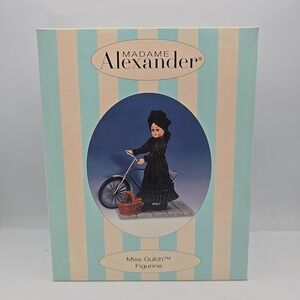 Rare Figurine Doll, Miss Gulch with Bicycle and Busket, Madam Alexander NIB